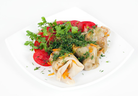 Stuffed cabbage rolls with tomato and parsley.の写真素材