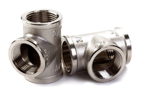 Metal plumbing fittings on white backgroundの写真素材