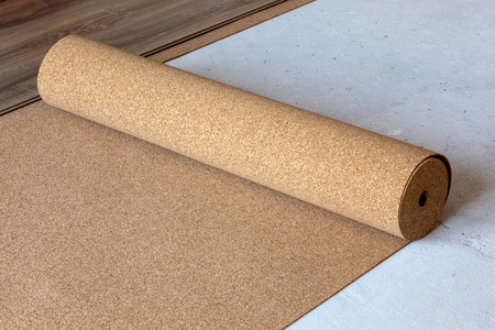 natural cork substrate on the floor with laminateの写真素材