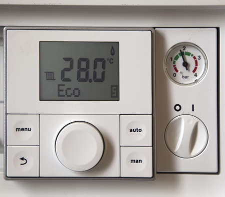 Heating and hot water boiler control regulator.
