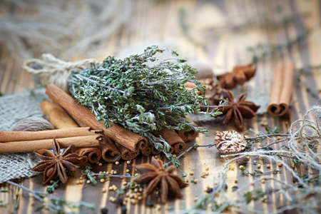 Assorted spices and fresh thymeの写真素材