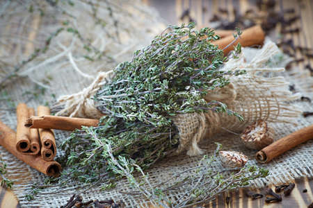 Assorted spices and fresh thymeの写真素材