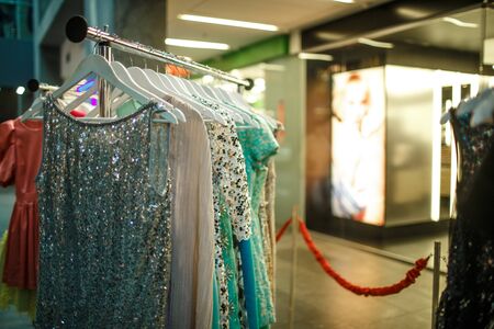 Female clothes in a fashion shopの写真素材