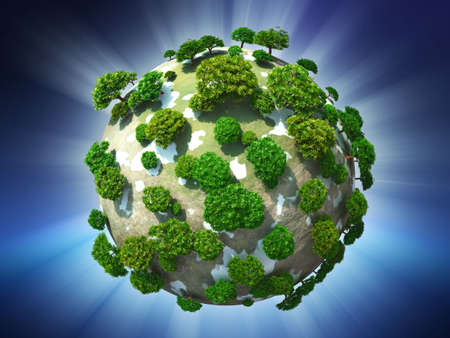 Green planet on radiant sky backgroundの写真素材