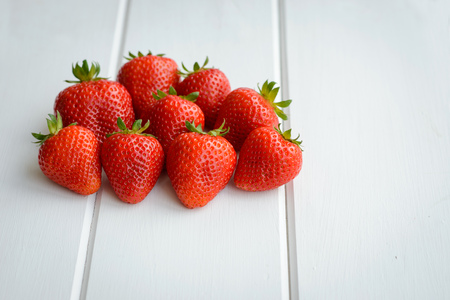 Tasty strawberry on a white tableの写真素材