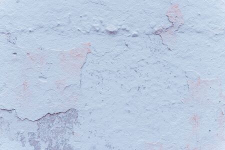 Wall fragment with scratches and cracksの写真素材