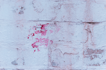 Brick texture with scratches and cracksの写真素材