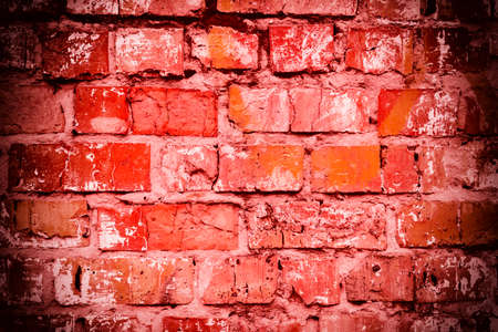 Brick texture with scratches and cracksの写真素材