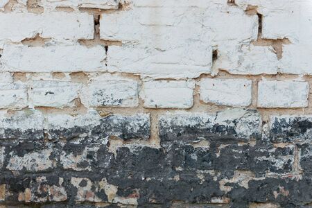 Brick texture with scratches and cracksの写真素材