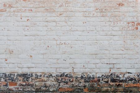 Brick texture with scratches and cracksの写真素材