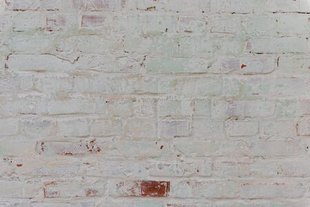 Brick texture with scratches and cracksの写真素材
