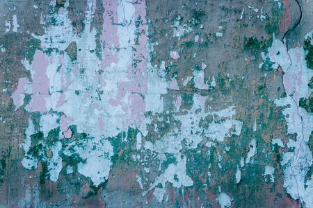 Wall fragment with scratches and cracks