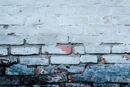 Brick texture with scratches and cracksの写真素材