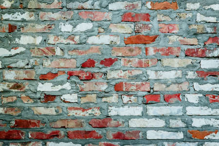 Brick texture with scratches and cracksの写真素材