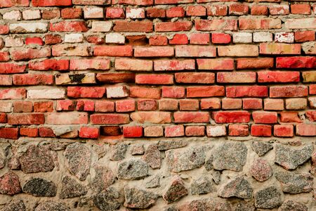 Brick texture with scratches and cracksの写真素材