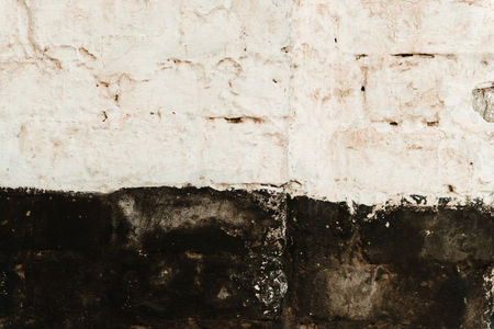 Brick texture with scratches and cracksの写真素材