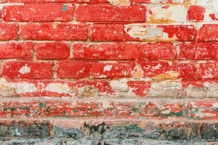 Brick texture with scratches and cracksの写真素材