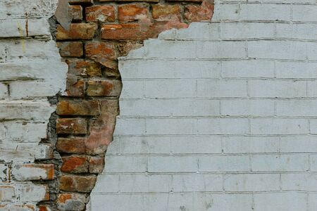 Brick texture with scratches and cracksの写真素材