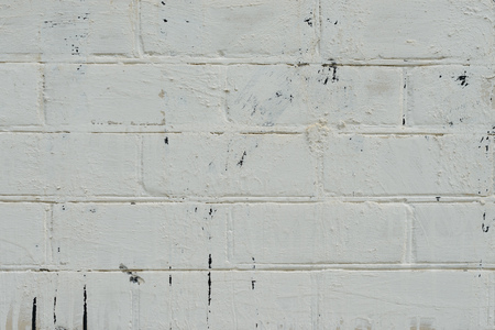 Brick texture with scratches and cracksの写真素材