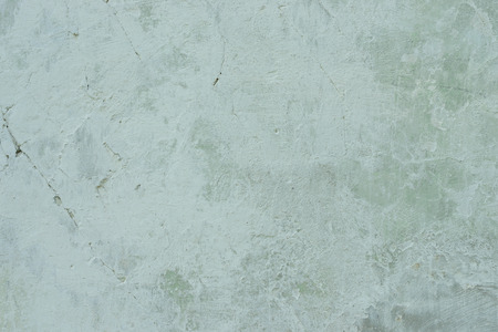 Wall fragment with scratches and cracksの写真素材