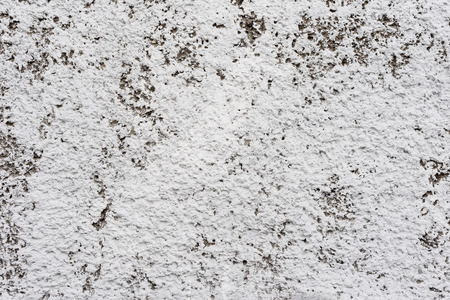 Wall fragment with scratches and cracks