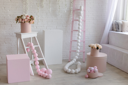 House interior in pink and white tones. It can be used as a backgroundの写真素材
