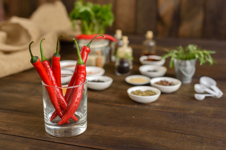 Various spices on wooden spoons. Food ingredientsの写真素材