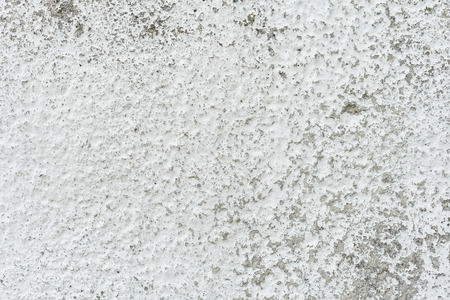 Wall fragment with scratches and cracksの写真素材