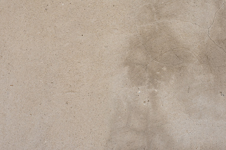 Wall fragment with scratches and cracks. It can be used as a backgroundの写真素材