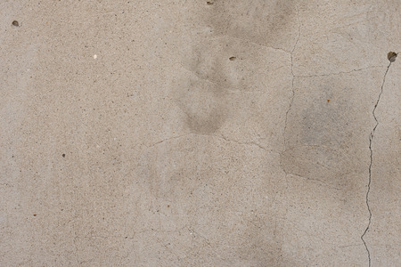 Wall fragment with scratches and cracks. It can be used as a backgroundの写真素材
