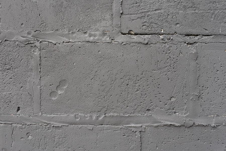 Texture, brick, wall, can be used as a background. Brick texture with scratches and cracksの写真素材