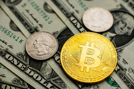 Bitcoin, Currency, digital, finance, economy. Golden bitcoin on us dollars close upの写真素材