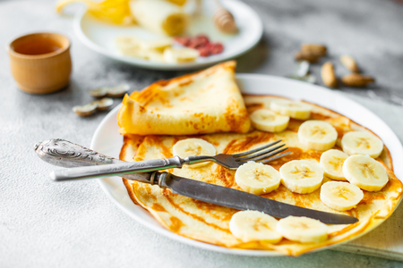 Tasty beautiful pancakes with honeyの写真素材