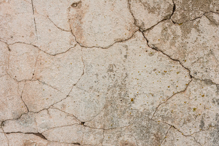 Wall fragment with scratches and cracksの写真素材
