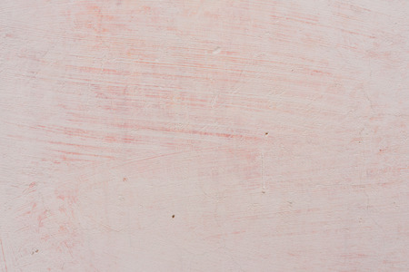 Wall fragment with scratches and cracksの写真素材