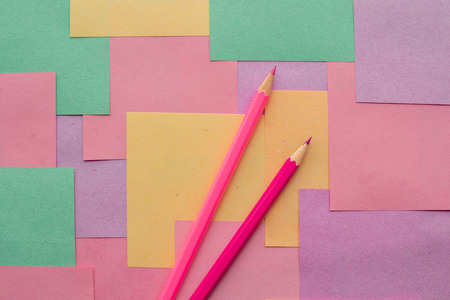 Colored pencils on detachable leaflets for notes. It can be used as a background