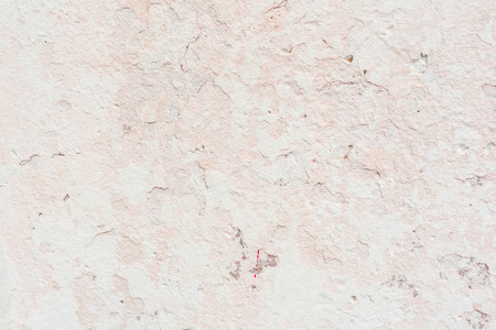 Wall fragment with scratches and cracksの写真素材