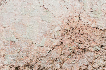 Wall fragment with scratches and cracks