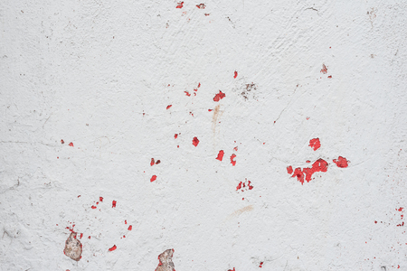 Wall fragment with scratches and cracksの写真素材