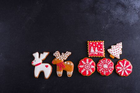 Christmas homemade gingerbread cookies on a dark backgroundの写真素材