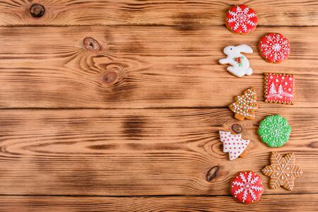 Christmas homemade gingerbread cookies on wooden tableの写真素材