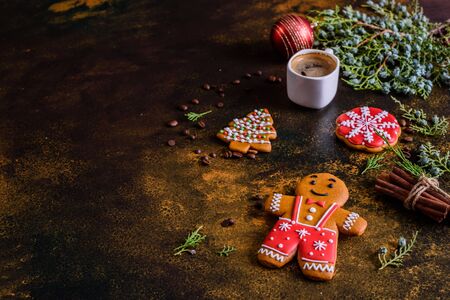 Christmas homemade gingerbread cookies on a dark background