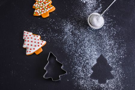 Christmas homemade gingerbread cookies on a dark backgroundの写真素材