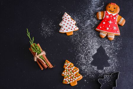 Christmas homemade gingerbread cookies on a dark backgroundの写真素材