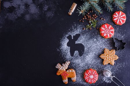Christmas homemade gingerbread cookies on a dark backgroundの写真素材