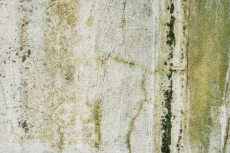 Texture of a concrete wall with cracks and scratches which can be used as a background