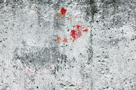 Wall fragment with scratches and cracksの写真素材