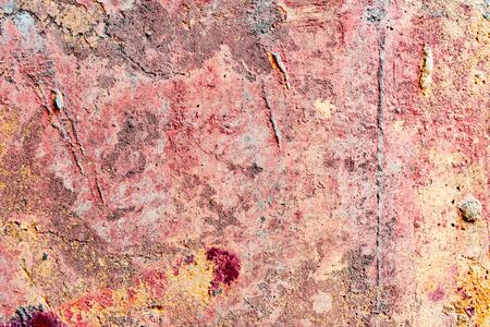 Wall fragment with scratches and cracksの写真素材