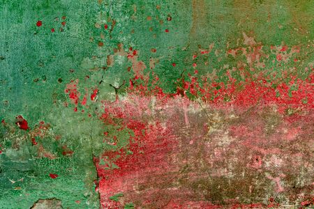 Texture of a concrete wall with cracks and scratches which can be used as a backgroundの写真素材