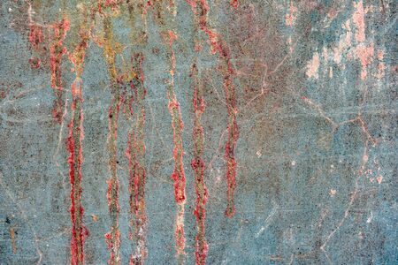 Texture of a concrete wall with cracks and scratches which can be used as a background